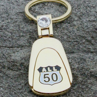 Brass Ring Multimedia design: All 50 Corvette "Route Sign" logo on deluxe key fob (image)
