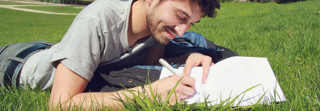 Man writing testimonial. (Image)