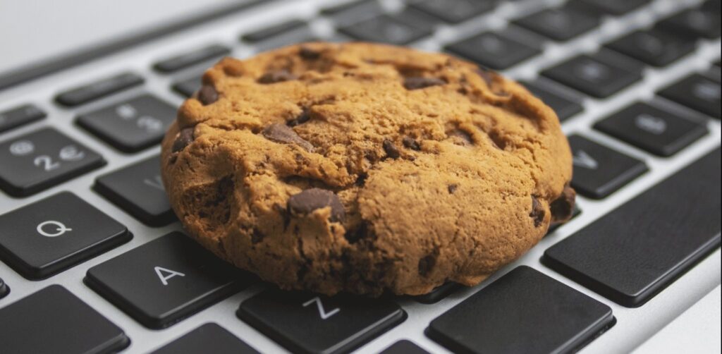 Internet cookies (image: cookie on laptop keyboard)